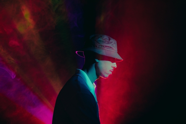 Image Of Bucket Hat Portrait With Colored Smoke 